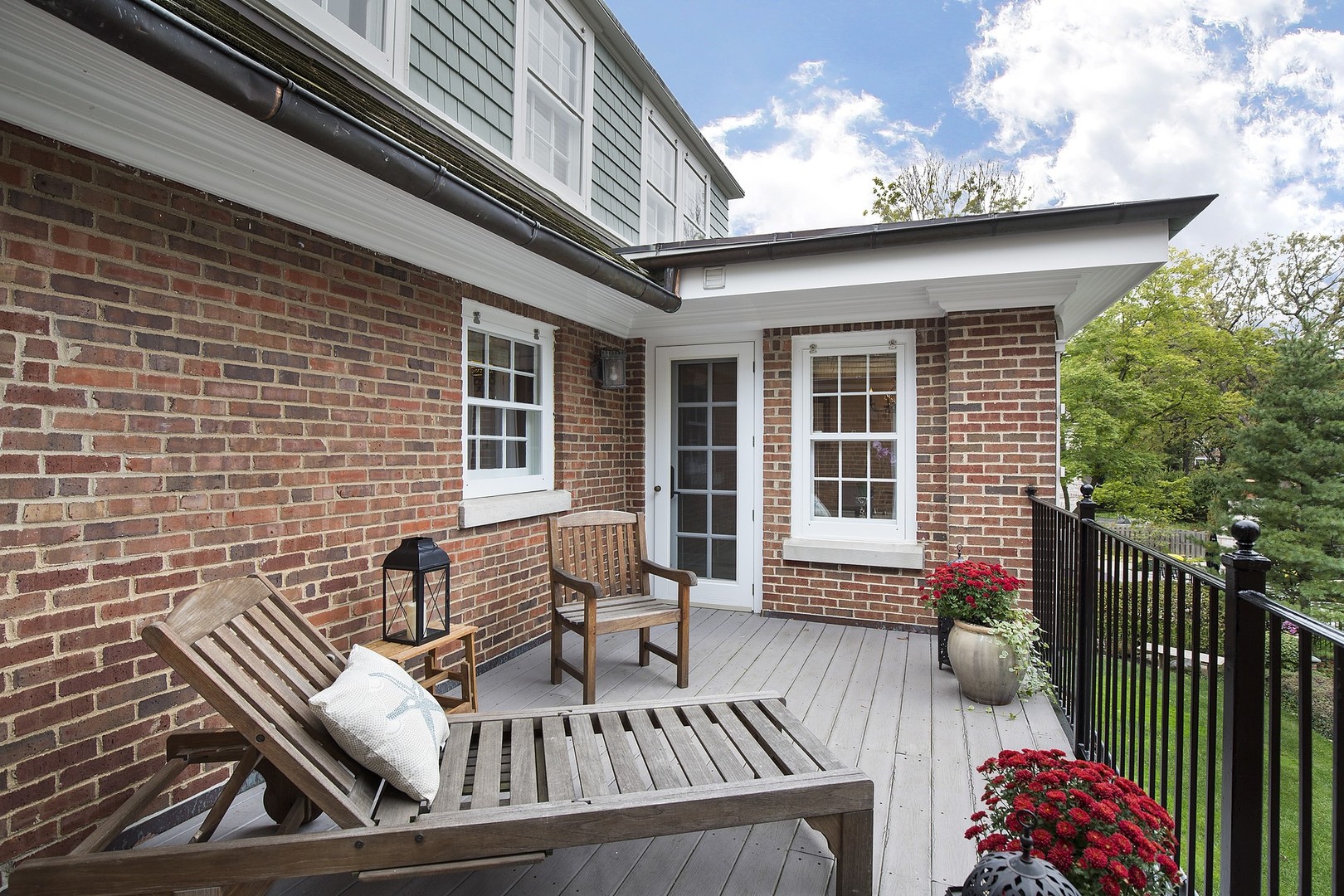 15 Old Green Bay Road Winnetka, IL 60093 - Photo 28 of 60 a view of a patio with couches table and chairs and potted plants