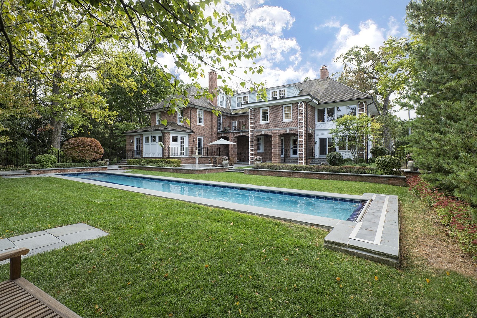 15 Old Green Bay Road Winnetka, IL 60093 - Photo 37 of 60 a house view with swimming pool and outdoor space