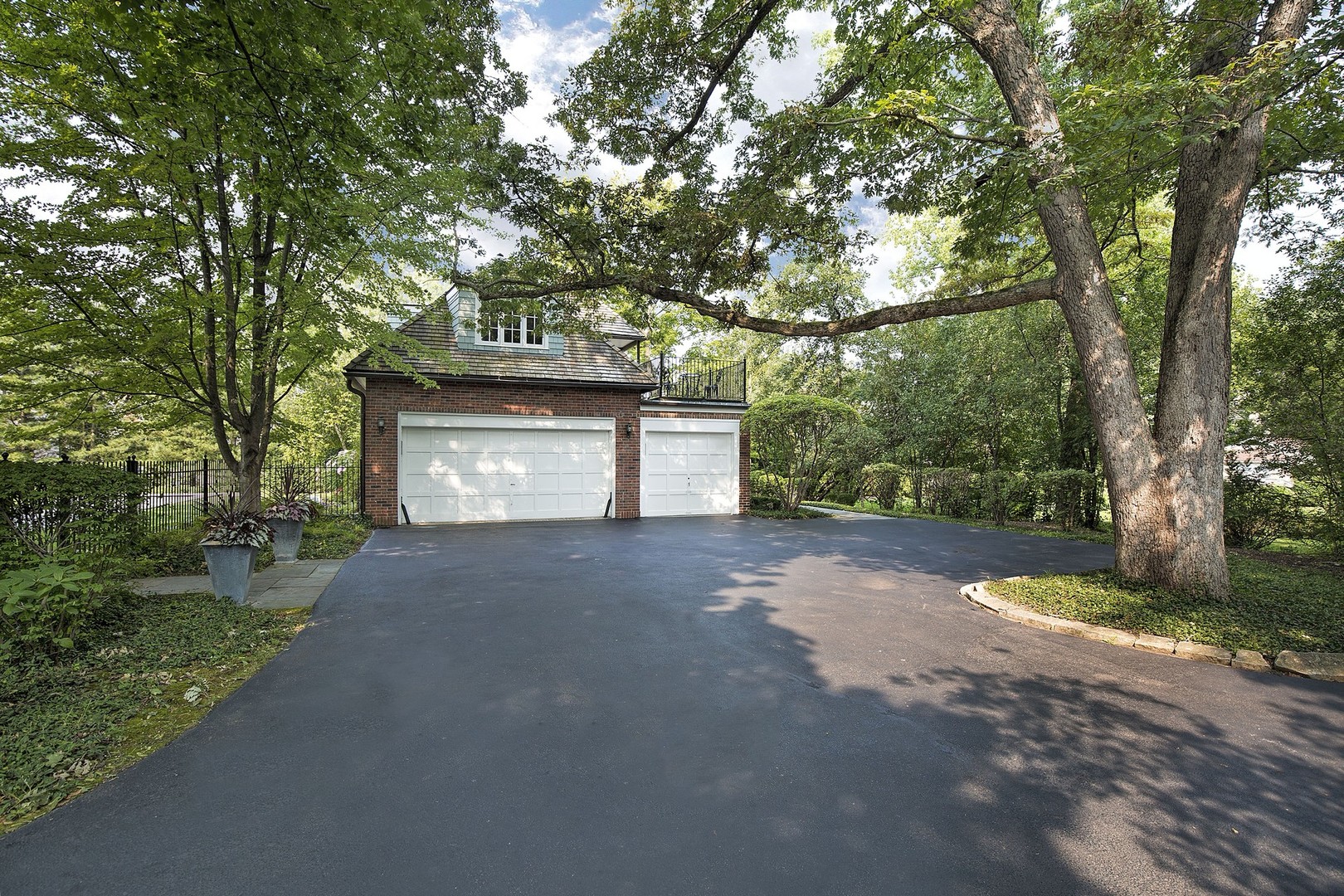 15 Old Green Bay Road Winnetka, IL 60093 - Photo 39 of 60 a road view with a plants and trees
