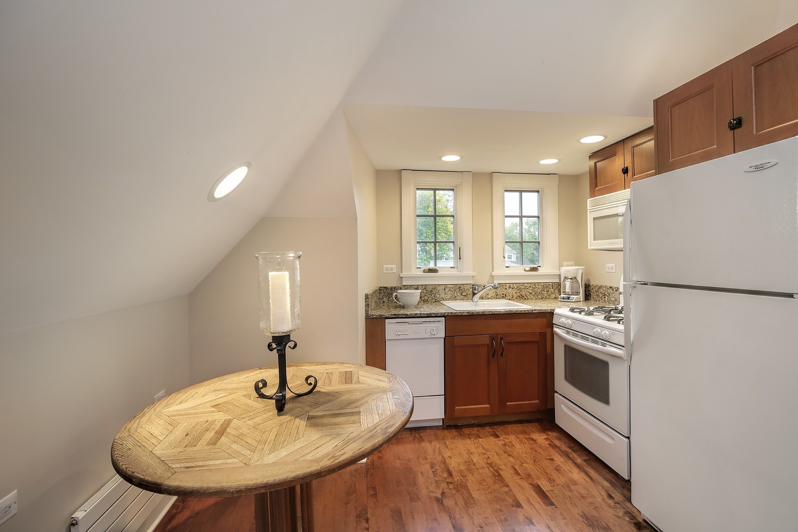 15 Old Green Bay Road Winnetka, IL 60093 - Photo 43 of 60 a kitchen with a sink appliances and cabinets