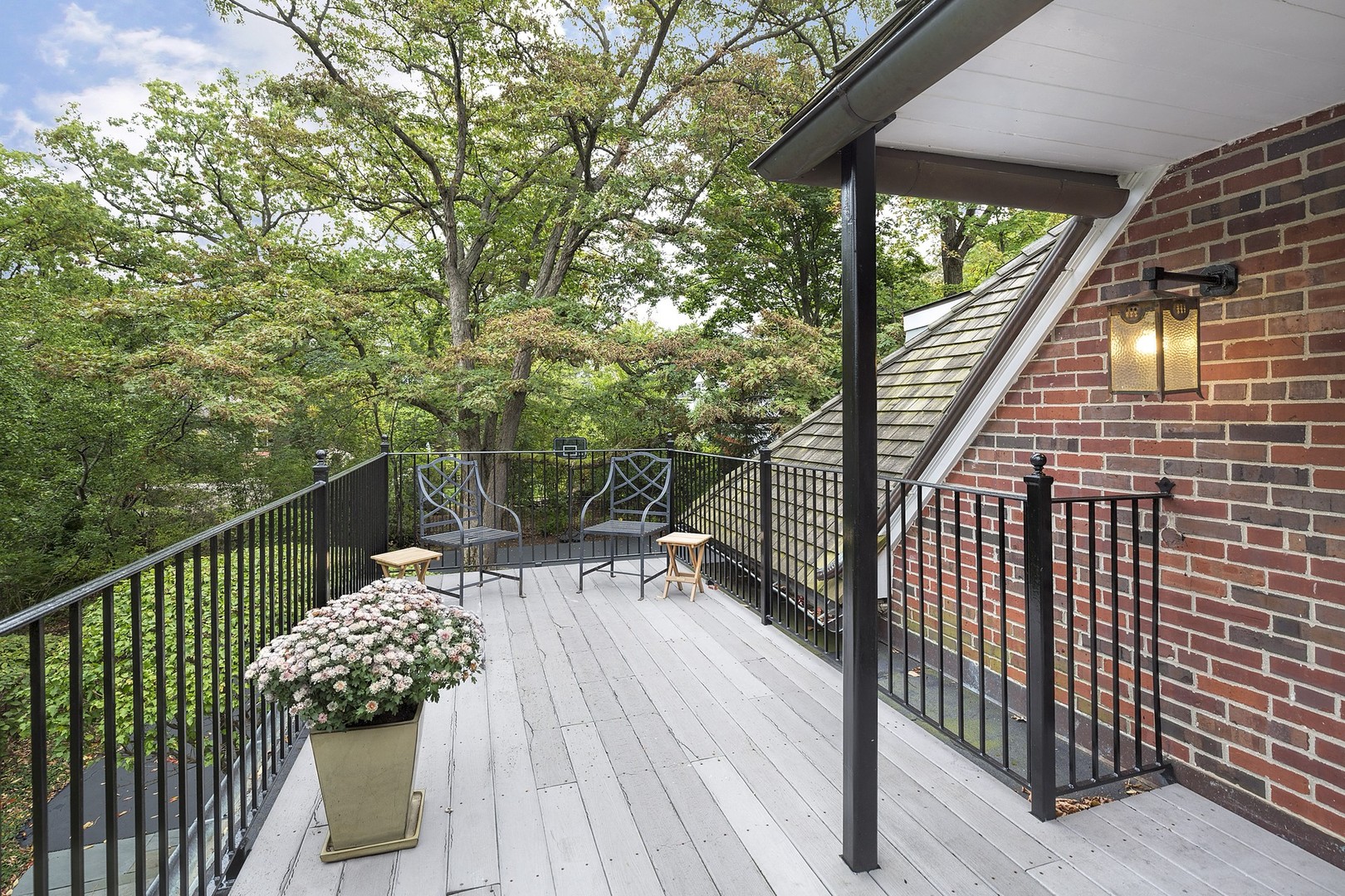 15 Old Green Bay Road Winnetka, IL 60093 - Photo 44 of 60 a balcony with wooden floor and fence