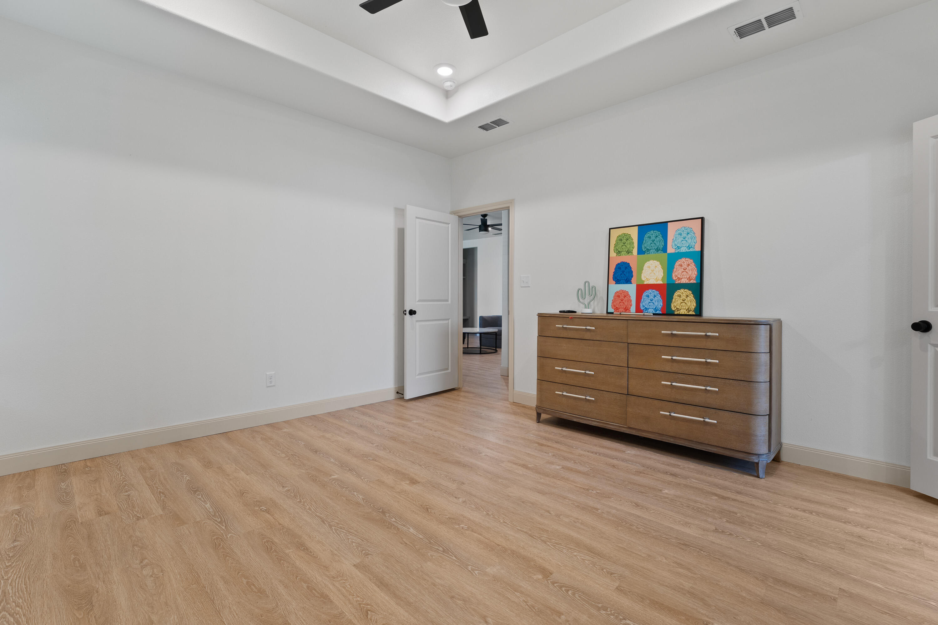 5516 120th Street Lubbock, TX 79424 - Photo 15 of 30 a room with couch and wooden floor