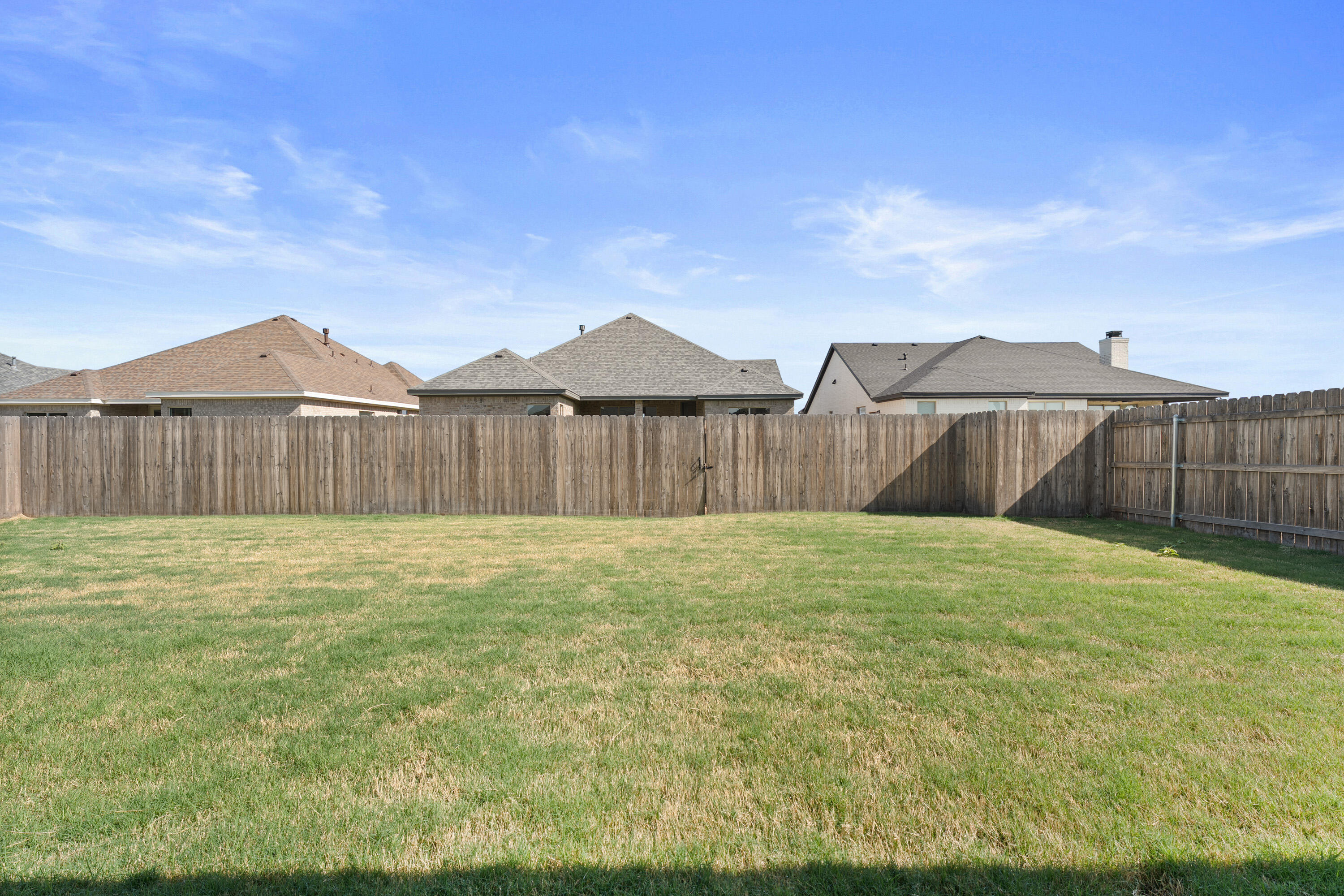 5516 120th Street Lubbock, TX 79424 - Photo 33 of 34 a backyard of a house