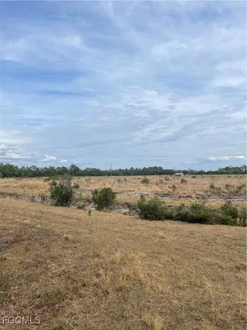 a view of lake with mountain