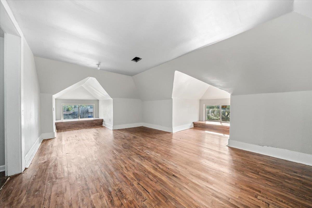 196 North McNeil Street Memphis, TN 38112 - Photo 21 of 31 an empty room with wooden floor and windows