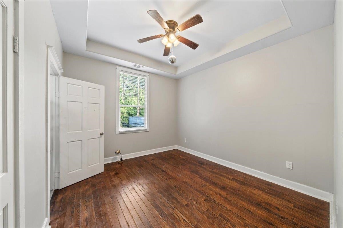 196 North McNeil Street Memphis, TN 38112 - Photo 26 of 31 wooden floor in an empty room with a window