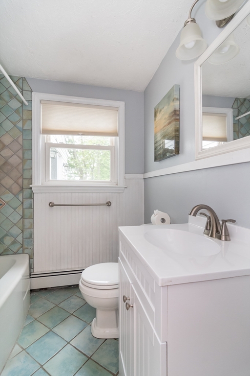 14 Wedgewood Road Natick, MA 01760 - Photo 11 of 28 a bathroom with a sink a toilet and a window