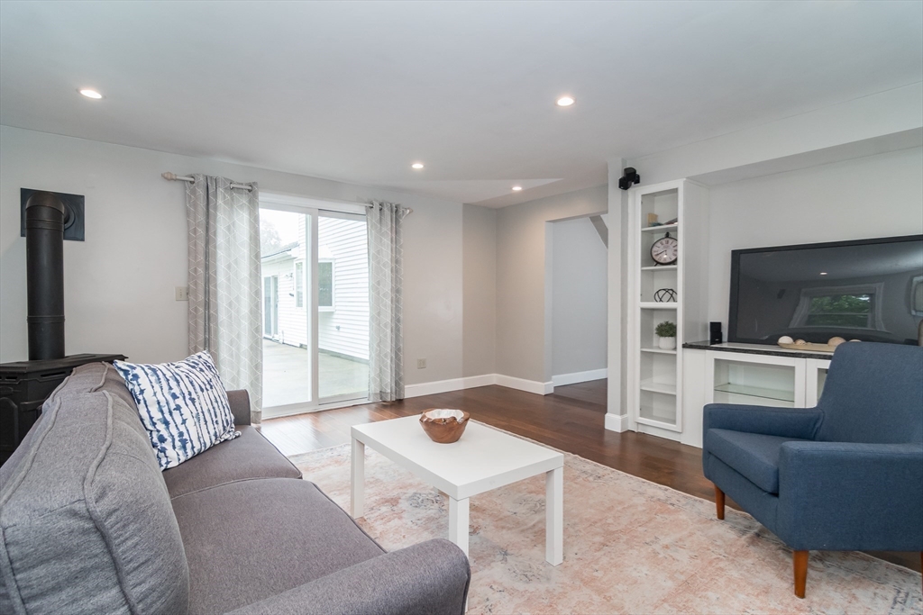 14 Wedgewood Road Natick, MA 01760 - Photo 17 of 28 a living room with furniture and a flat screen tv