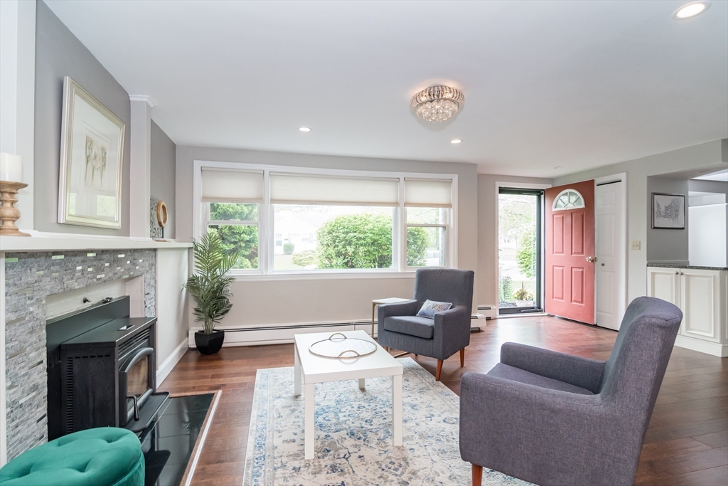 14 Wedgewood Road Natick, MA 01760 - Photo 2 of 28 a living room with furniture and a fireplace