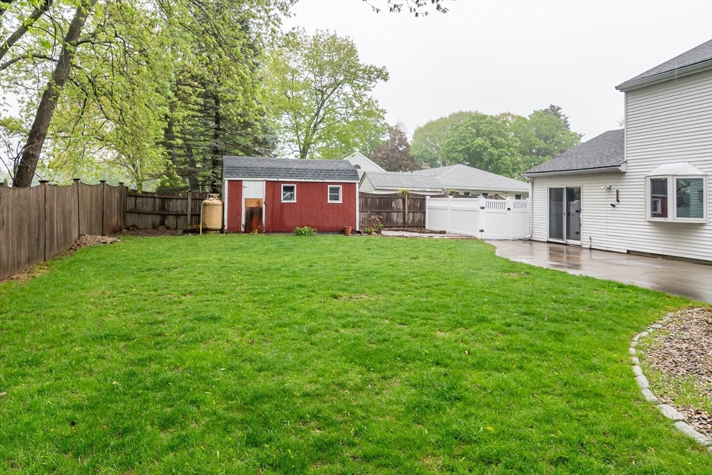 14 Wedgewood Road Natick, MA 01760 - Photo 27 of 28 a house view with a garden space