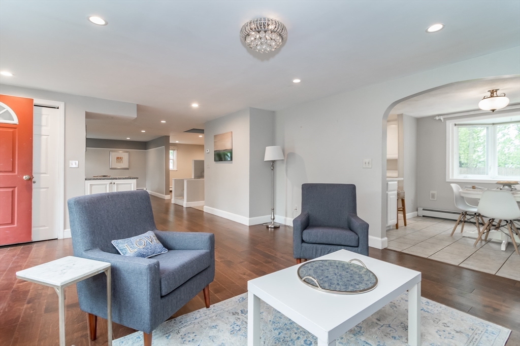 14 Wedgewood Road Natick, MA 01760 - Photo 4 of 28 a living room with furniture and a table
