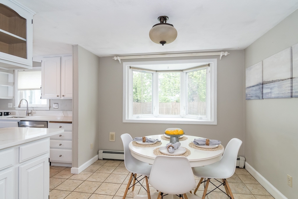 14 Wedgewood Road Natick, MA 01760 - Photo 6 of 28 a view of a dining room with furniture and window