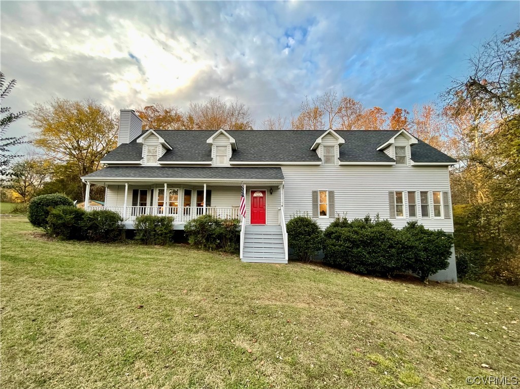 1751 Evans Mill Road Dillwyn, VA 23936 - Photo 1 of 50 a front view of a house with garden