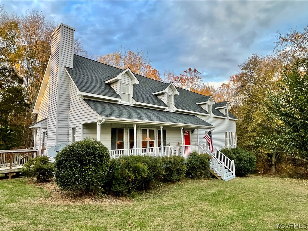 1751 Evans Mill Road Dillwyn, VA 23936 - Photo 3 of 50 a front view of a house with a yard