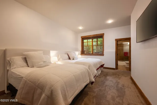 a view of balcony with wooden floor and fence