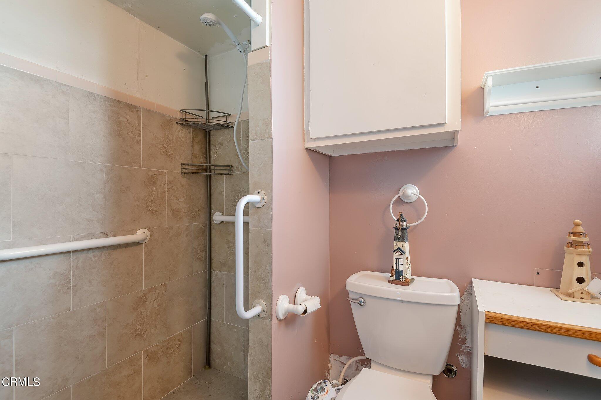 4810 Del Oro Place Oxnard, CA 93033 - Photo 12 of 21 a bathroom with a toilet and a sink