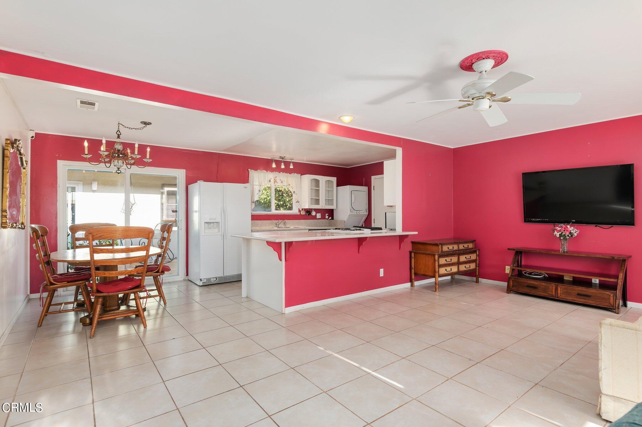4810 Del Oro Place Oxnard, CA 93033 - Photo 6 of 21 a living room with furniture and a flat screen tv
