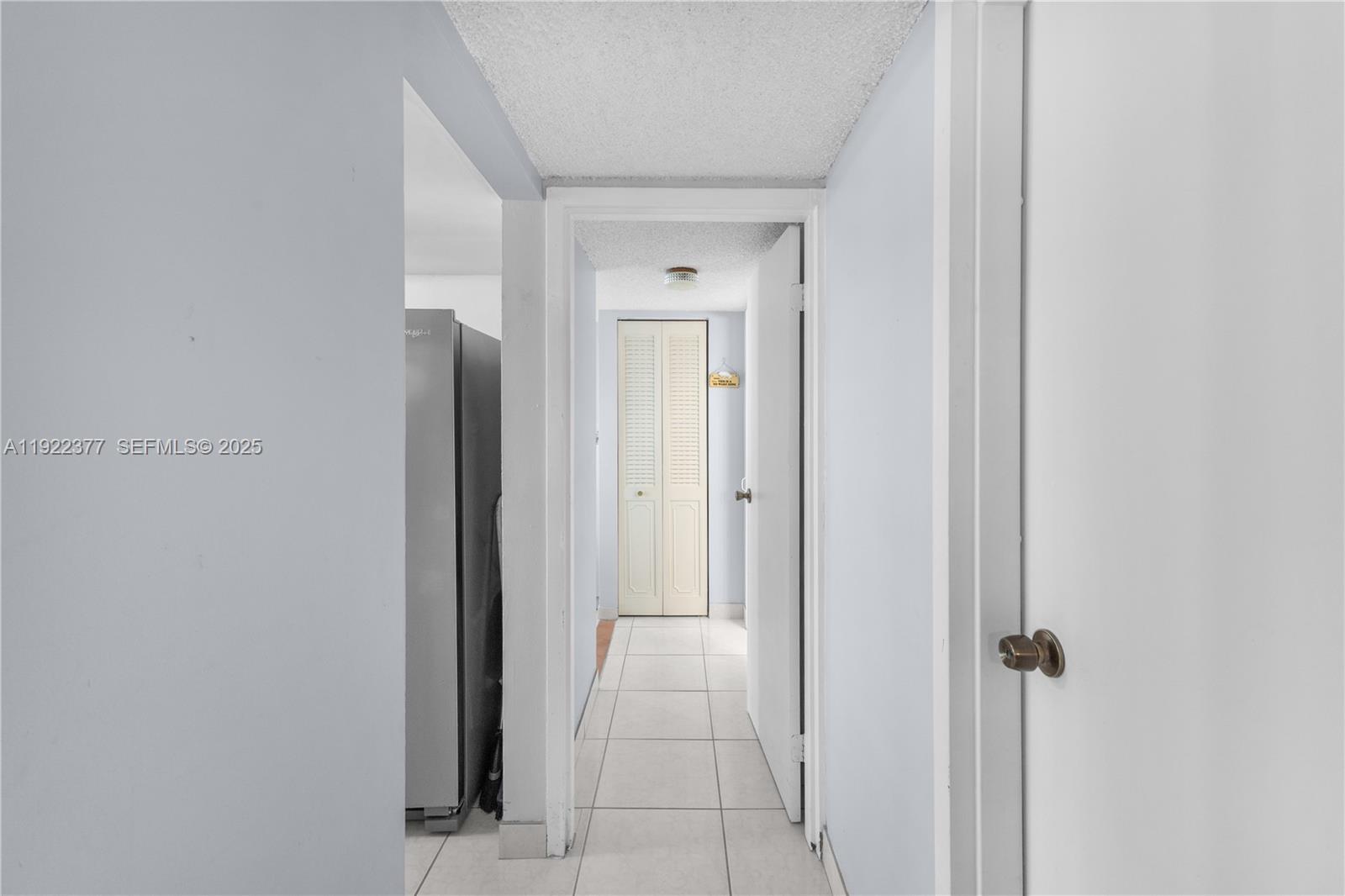 2655 Collins Avenue, Unit 603 Miami Beach, FL 33140 - Photo 31 of 66 a view of a hallway