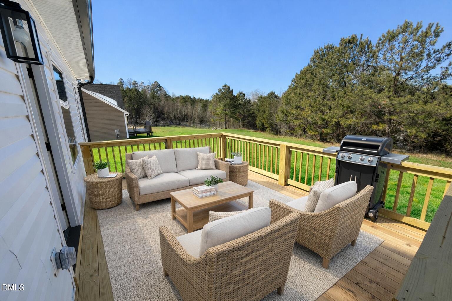 390 Park Springs Road Providence, NC 27315 - Photo 11 of 14 a balcony with furniture and a view