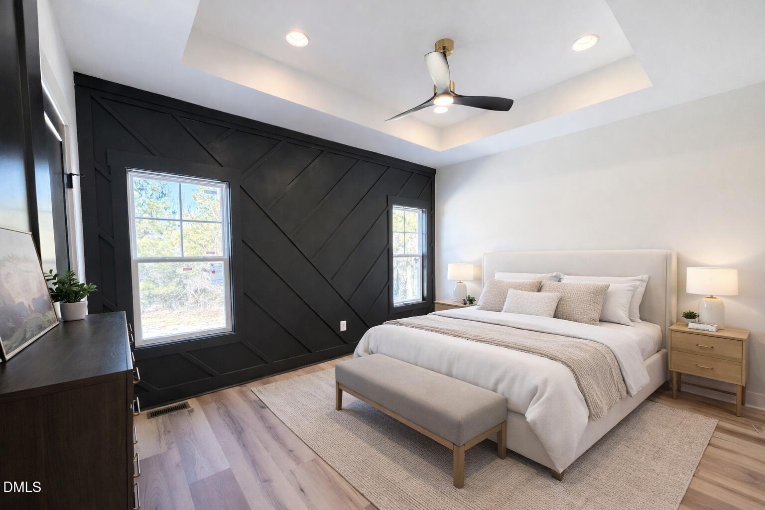 390 Park Springs Road Providence, NC 27315 - Photo 2 of 14 a bedroom with a large bed and a window