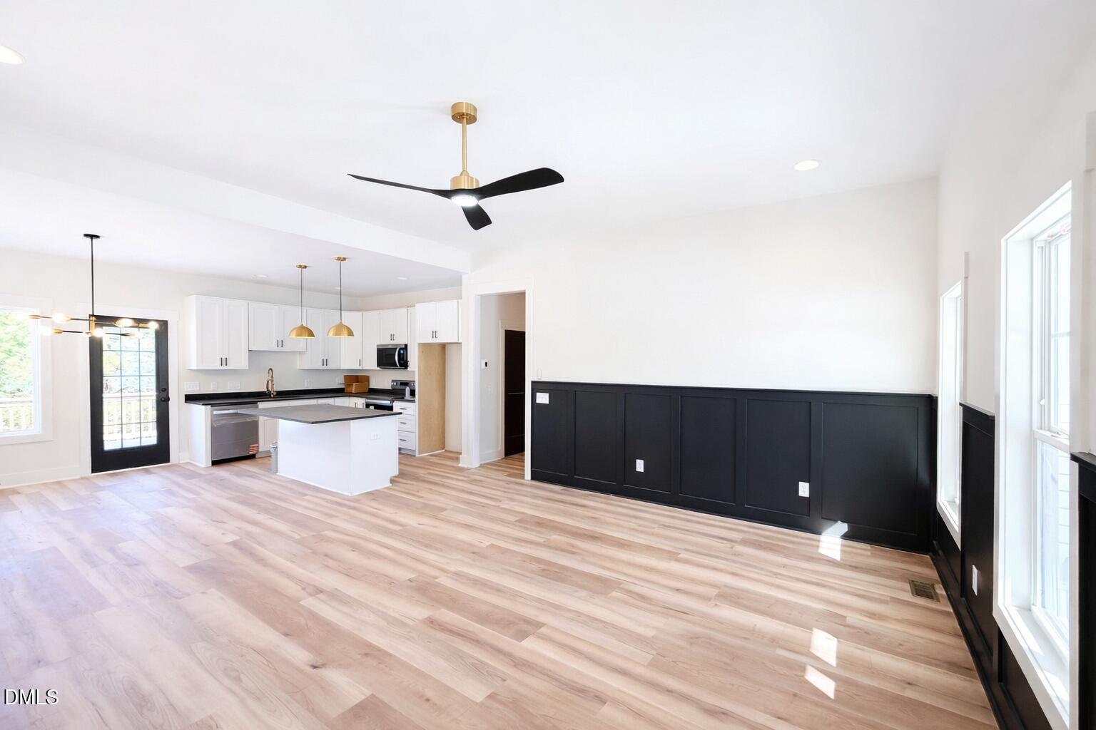 390 Park Springs Road Providence, NC 27315 - Photo 4 of 14 a view of a kitchen with a sink and stainless steel appliances