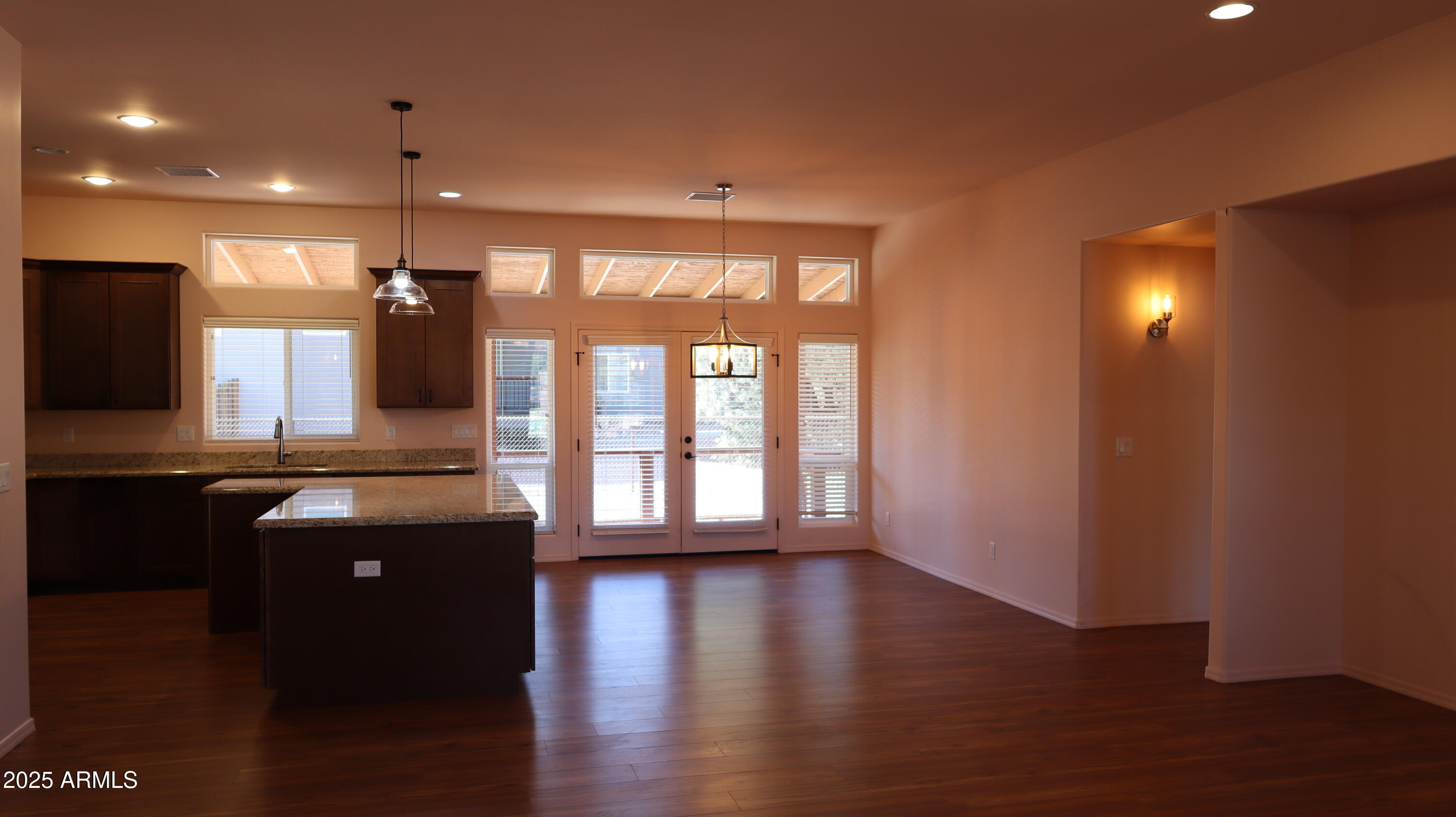 1701 West Dillon Way Payson, AZ 85541 - Photo 12 of 83 a view of a kitchen with wooden floor and a kitchen