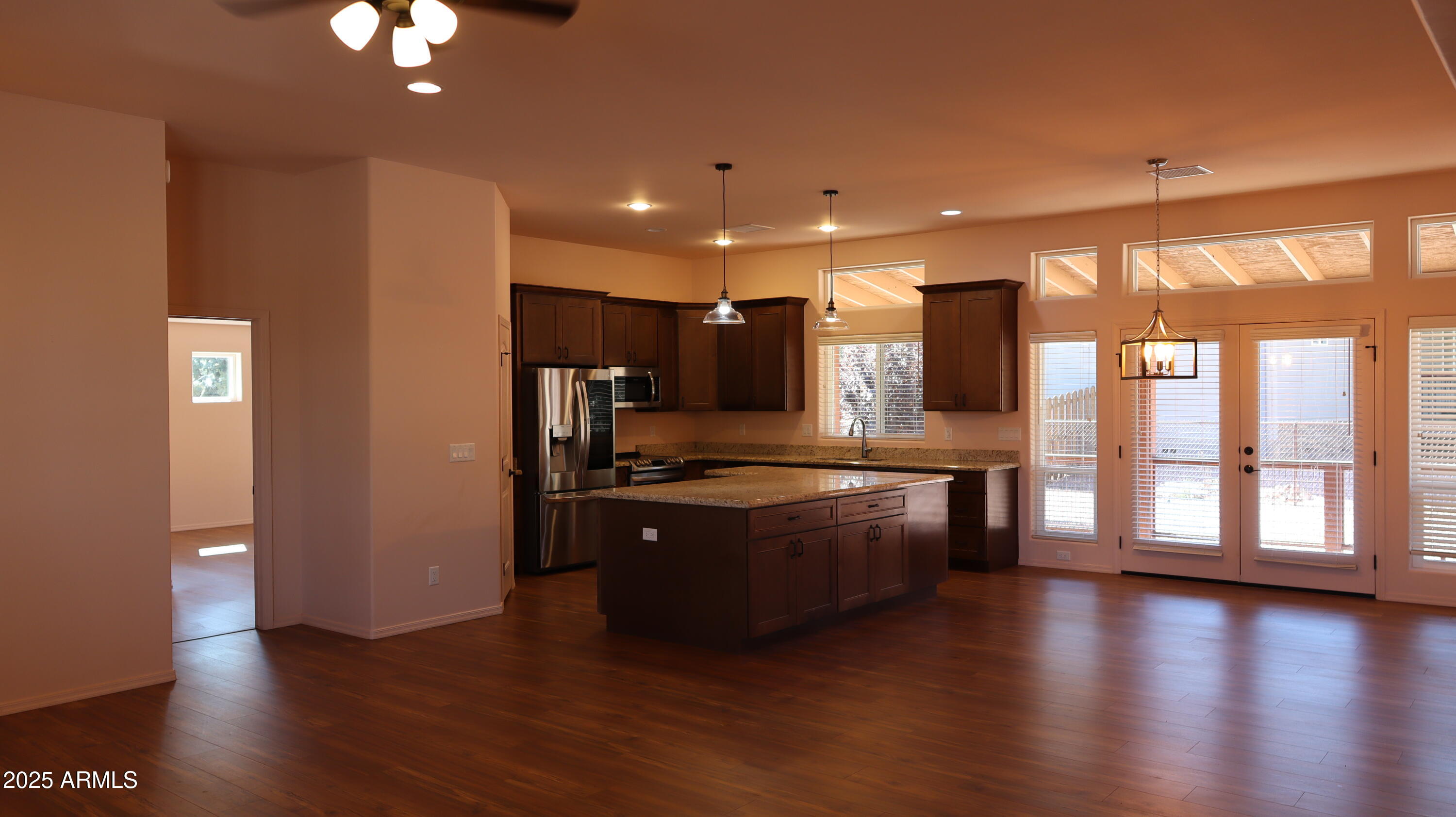 1701 West Dillon Way Payson, AZ 85541 - Photo 13 of 83 a large kitchen with stainless steel appliances granite countertop a large stove a sink and a refrigerator
