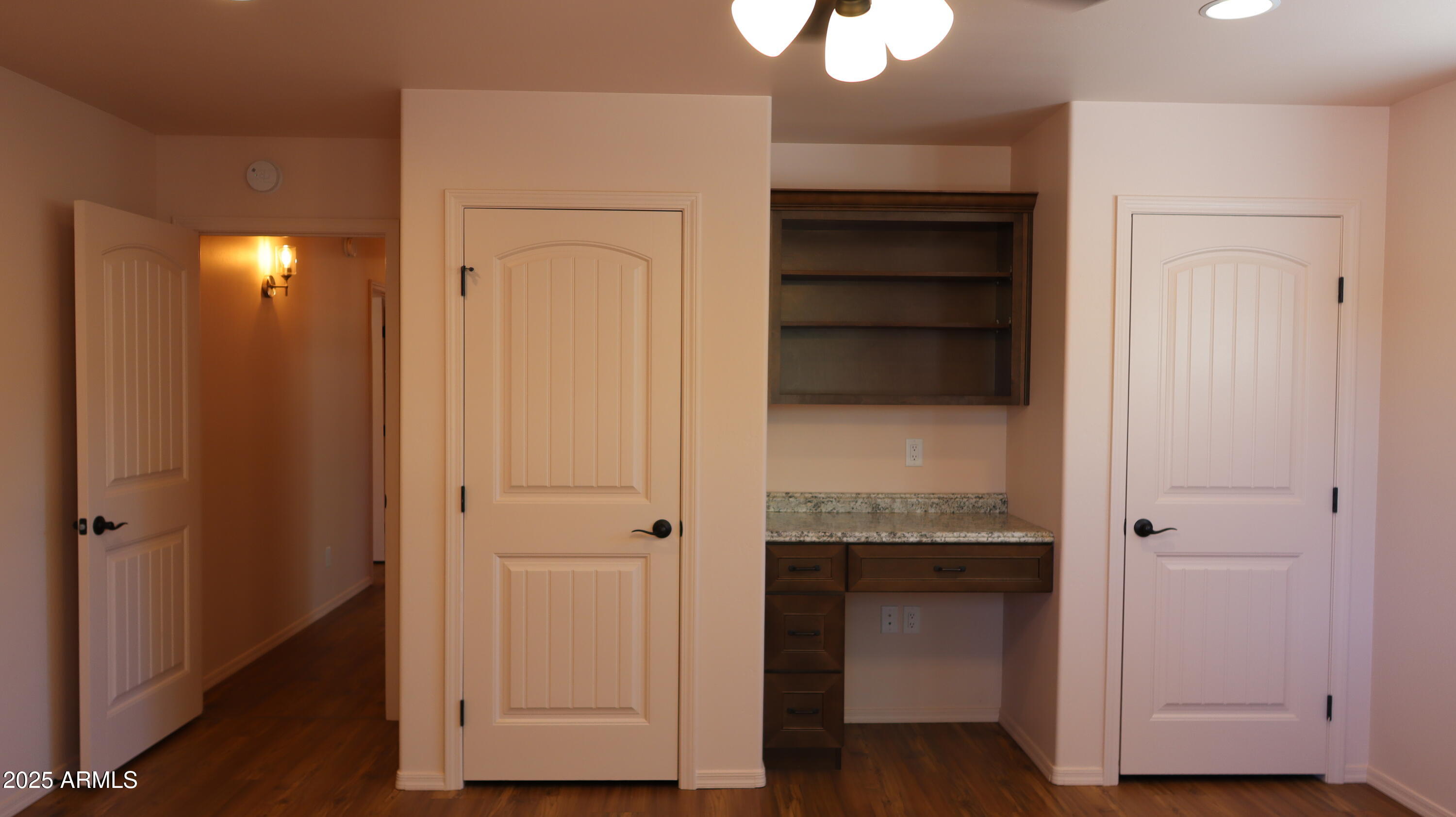 1701 West Dillon Way Payson, AZ 85541 - Photo 59 of 83 a view of walk in closet with wooden floor