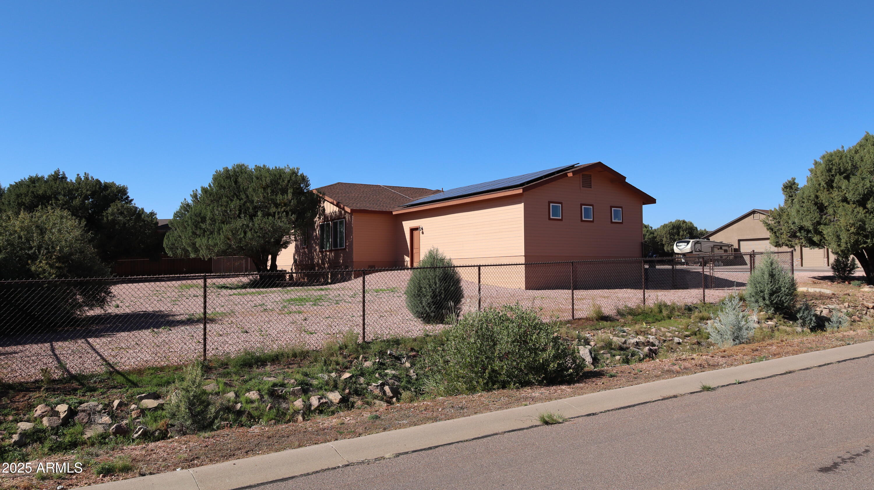 1701 West Dillon Way Payson, AZ 85541 - Photo 6 of 83 a front view of a house with a yard