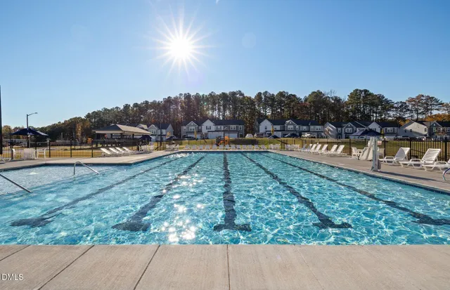 a view of a swimming pool and lake view