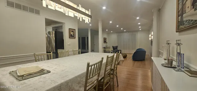 a bedroom with two beds and painted walls