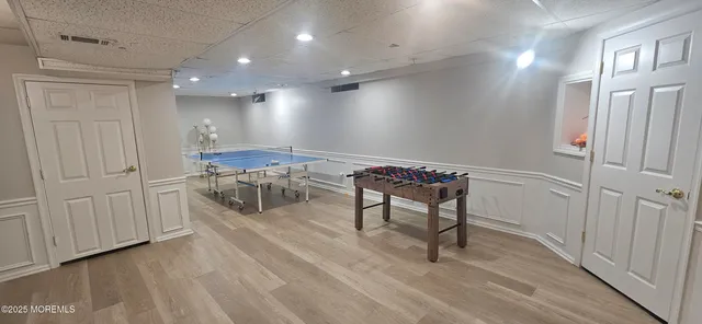 a bathroom with a shower and toilet