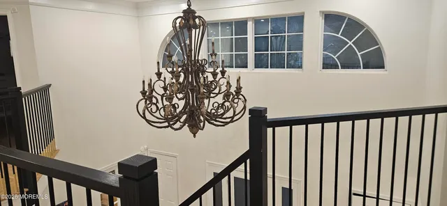 a bedroom with a bed and cabinet