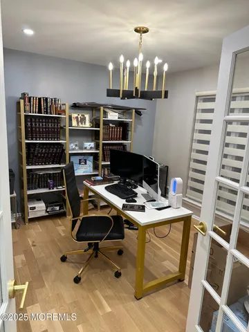 a view of living room kitchen with furniture and outdoor view