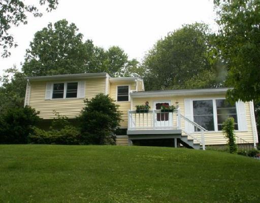 145 Sterling Road Trumbull, CT 06611 - Photo 1 of 1 a front view of house with yard and green space