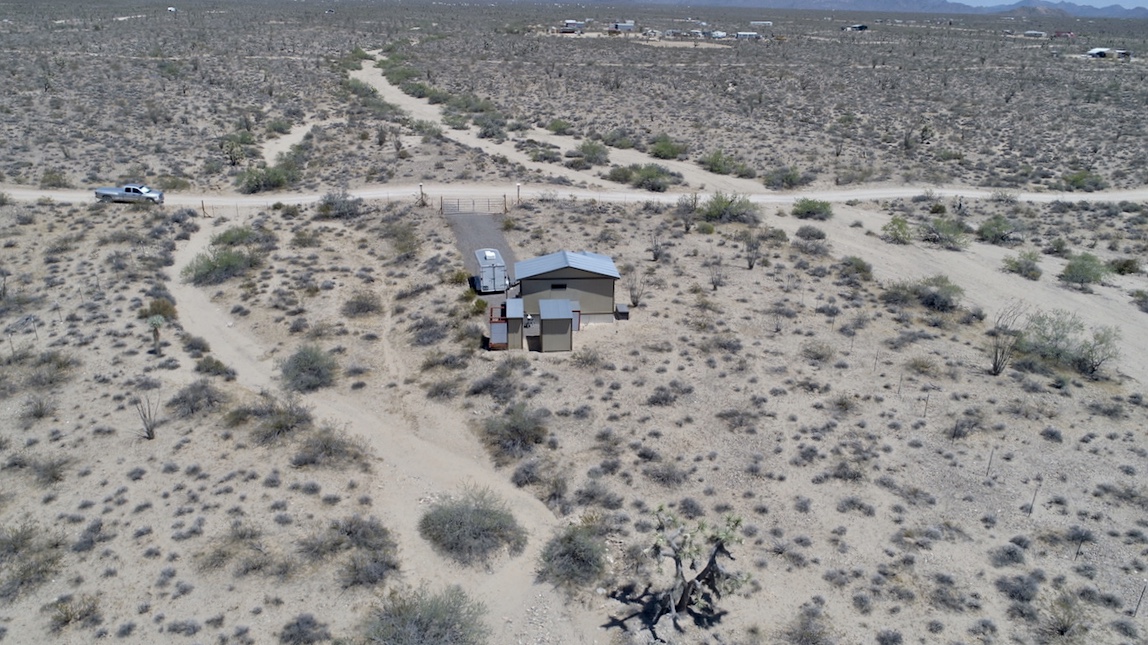 0 Desert View Road Yucca, AZ 86438 - Photo 12 of 17 a view of a dry yard with wooden floor