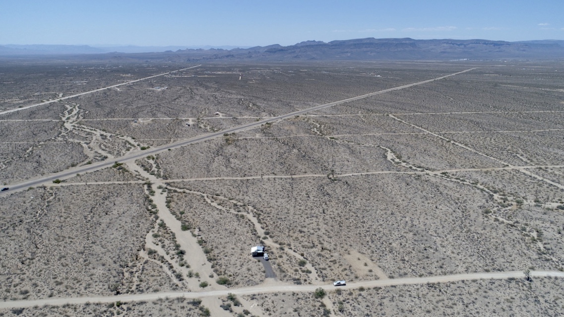 0 Desert View Road Yucca, AZ 86438 - Photo 17 of 17 a view of a dry yard with wooden floor