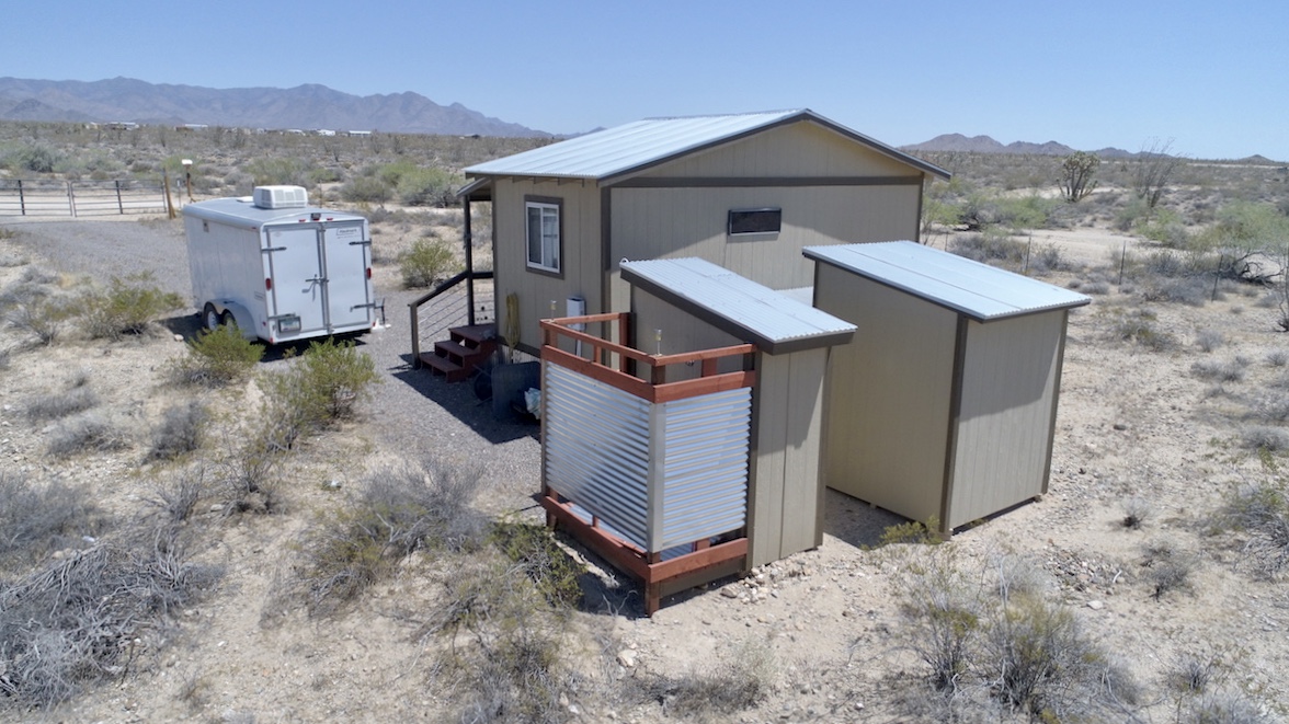 0 Desert View Road Yucca, AZ 86438 - Photo 5 of 17 a front view of a house with a yard