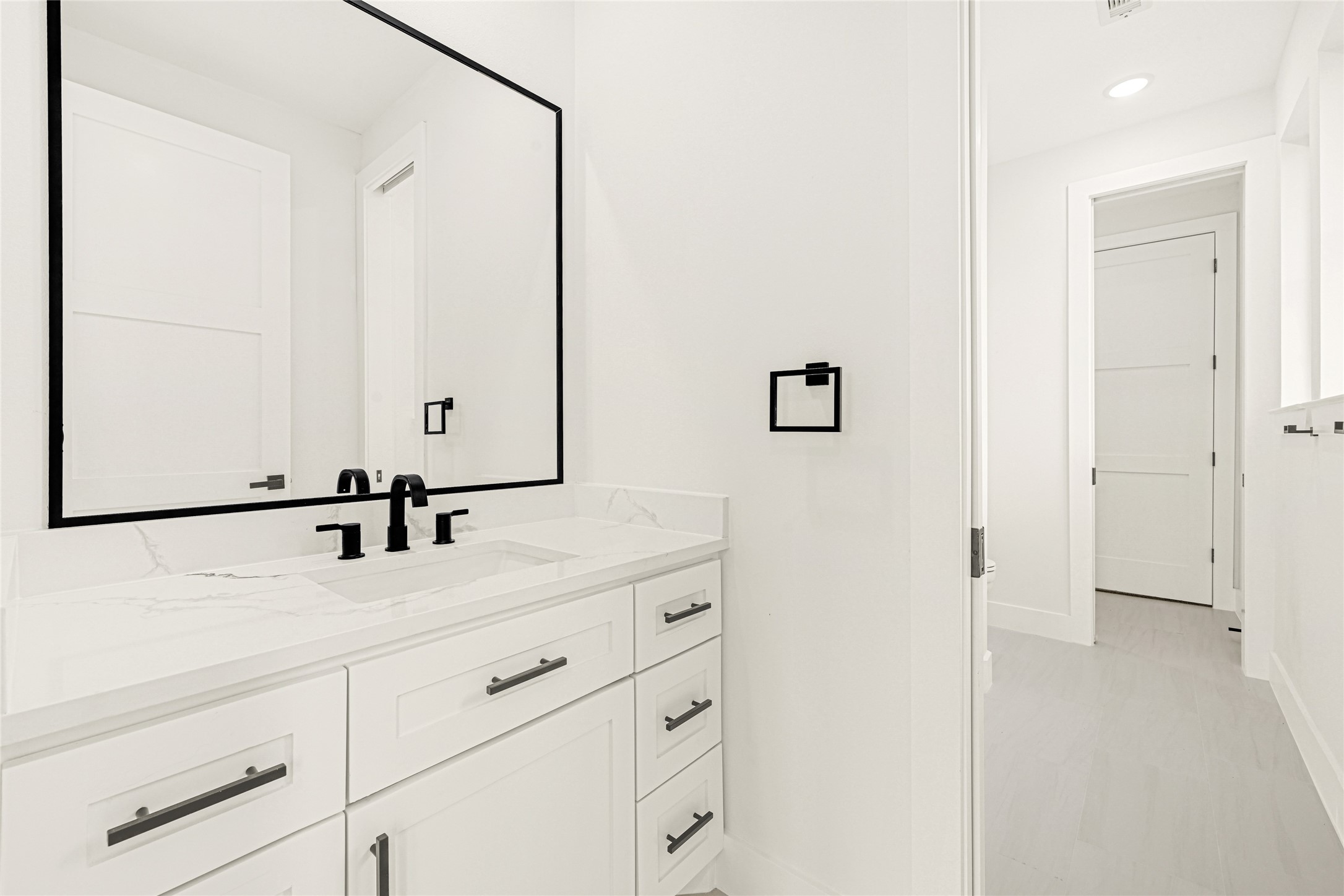 16915 Hamill Drive Rosharon, TX 77583 - Photo 33 of 47 a bathroom with a sink and a mirror