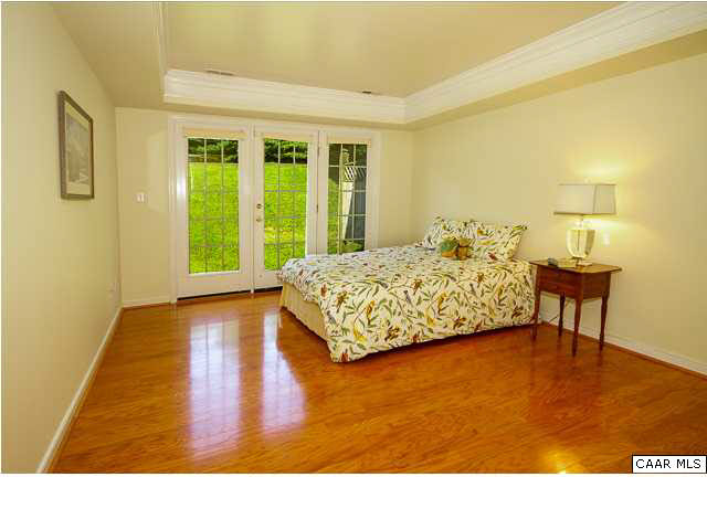 956 Devon Spring Court Charlottesville, VA 22903 - Photo 7 of 15 First Floor Master Bedroom suite has two closets and ...