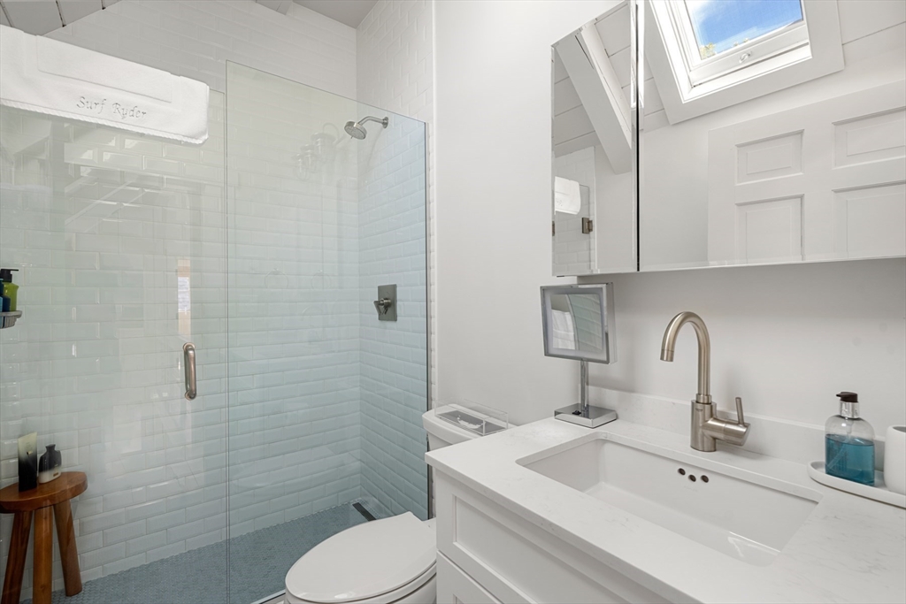 1 Doc Ryder Drive Nantucket, MA 02554 - Photo 25 of 42 a bathroom with a sink toilet and shower