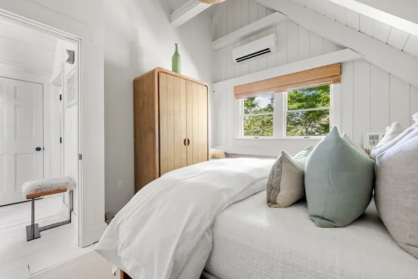 a view of living room with furniture and rug