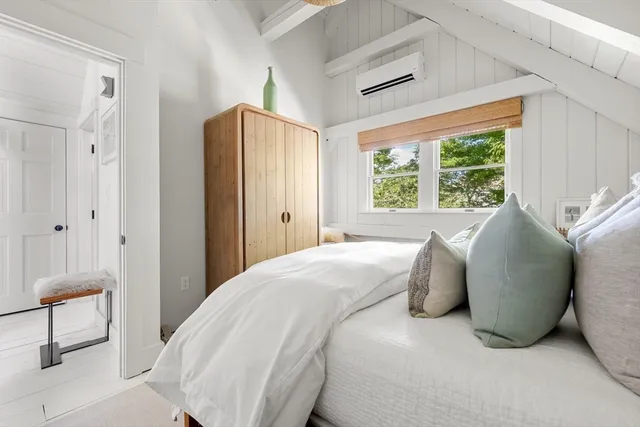 a view of living room with furniture and rug