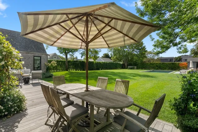 a view of a room with shelf and book shelf