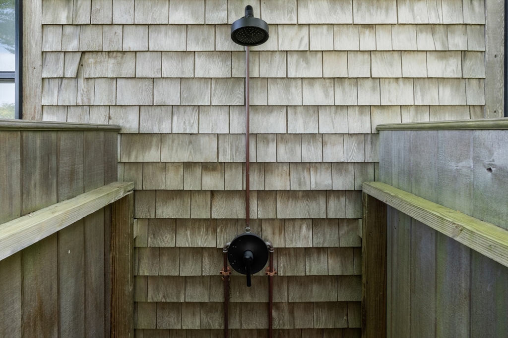 1 Doc Ryder Drive Nantucket, MA 02554 - Photo 31 of 42 a view of a room with shelf and book shelf