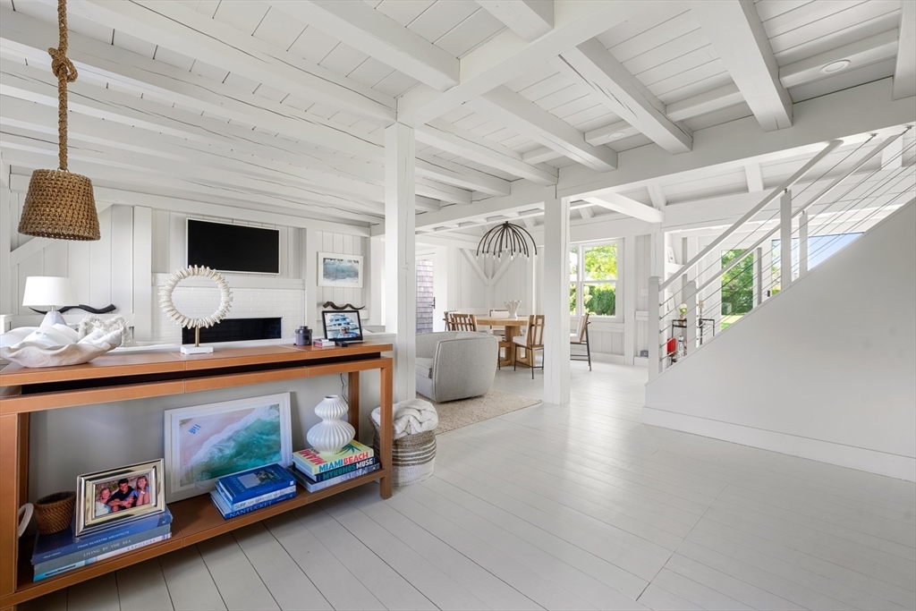 1 Doc Ryder Drive Nantucket, MA 02554 - Photo 7 of 42 a living room with furniture and a flat screen tv