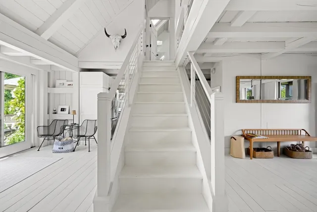 a living room with large windows