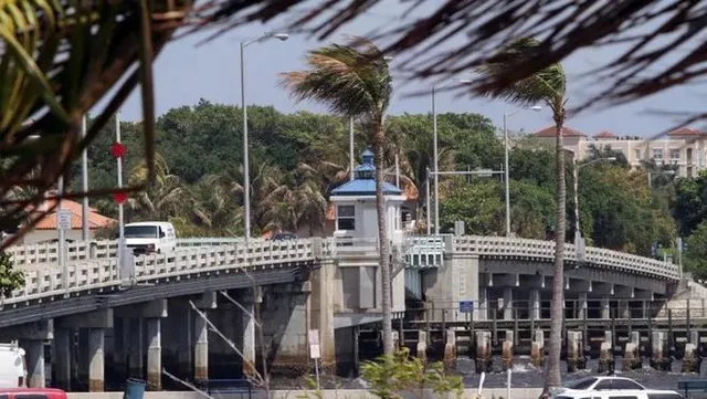 a view of a house with a swimming pool