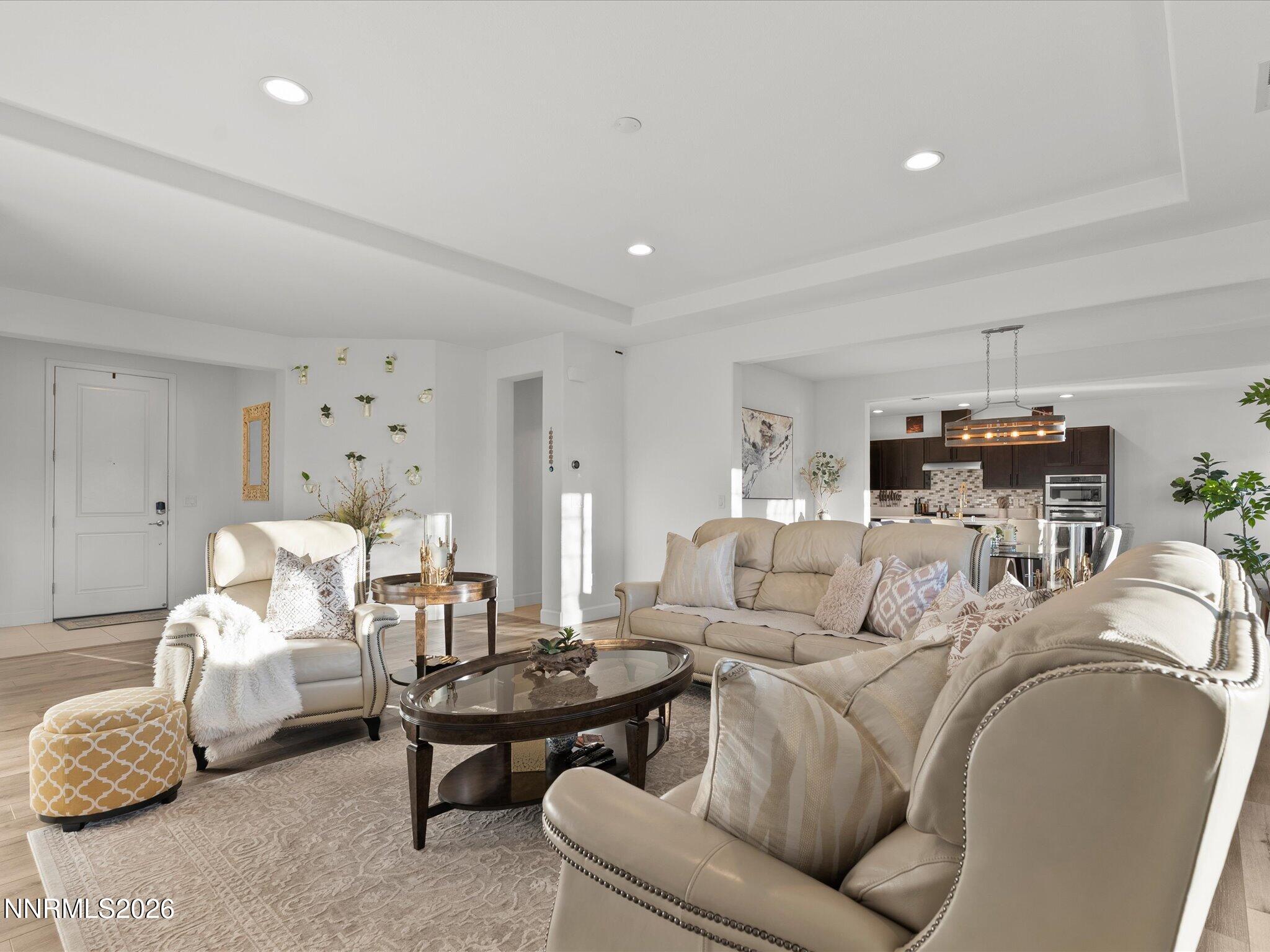 9803 Ash Meadow Drive Reno, NV 89521 - Photo 13 of 56 a living room with furniture and a table