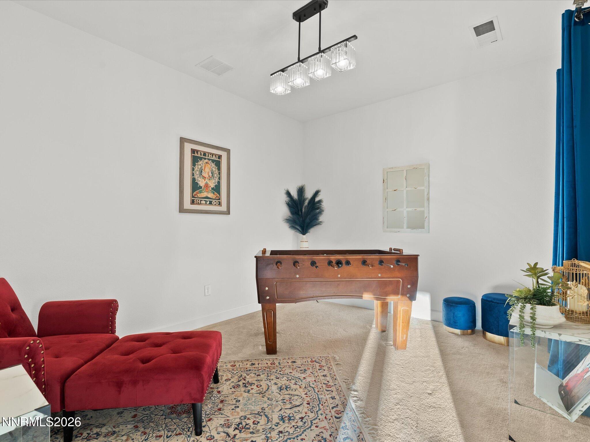 9803 Ash Meadow Drive Reno, NV 89521 - Photo 23 of 56 a room with furniture and a couch